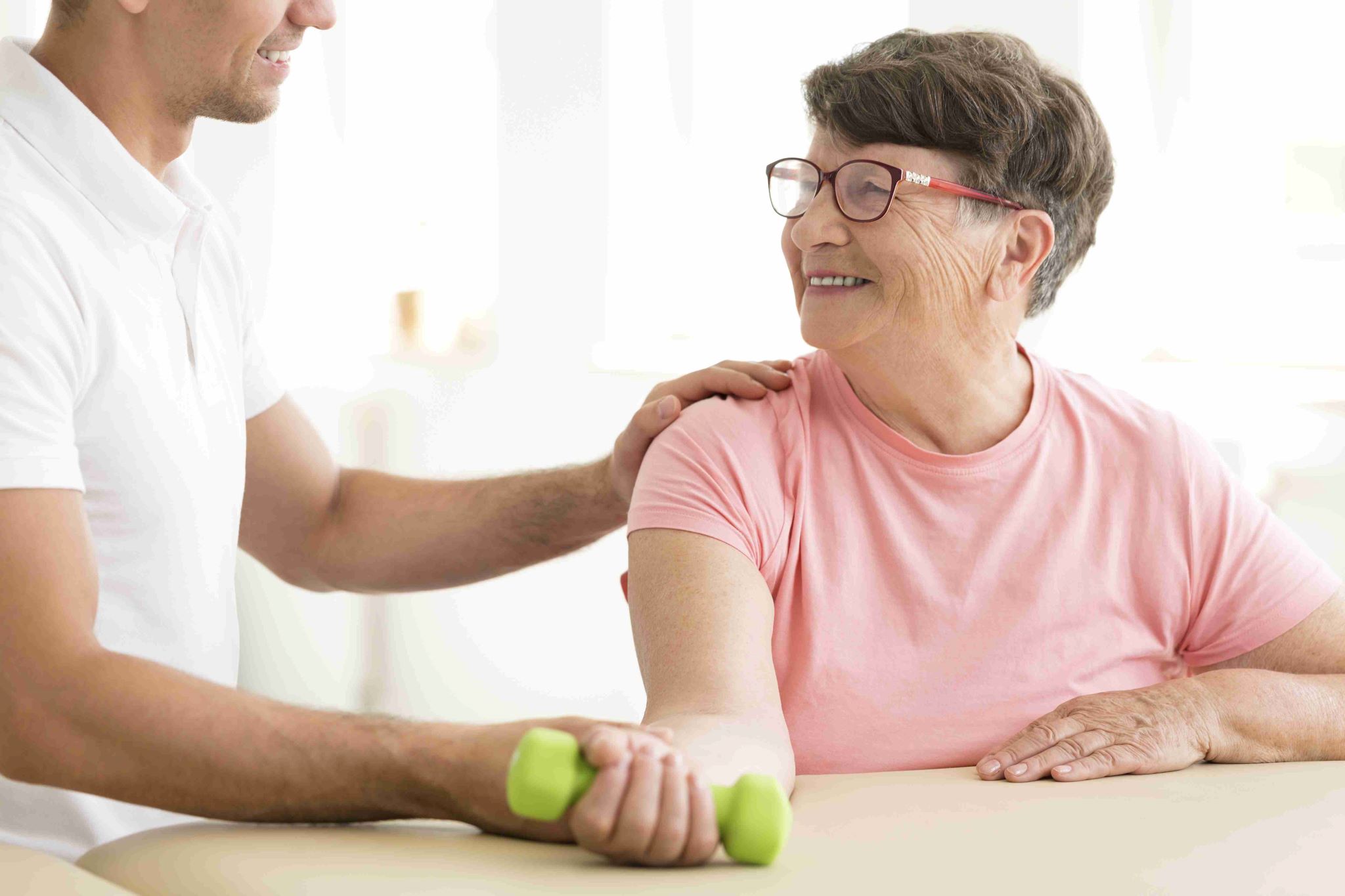 older woman in physical rehabilitation P452XZC compressed