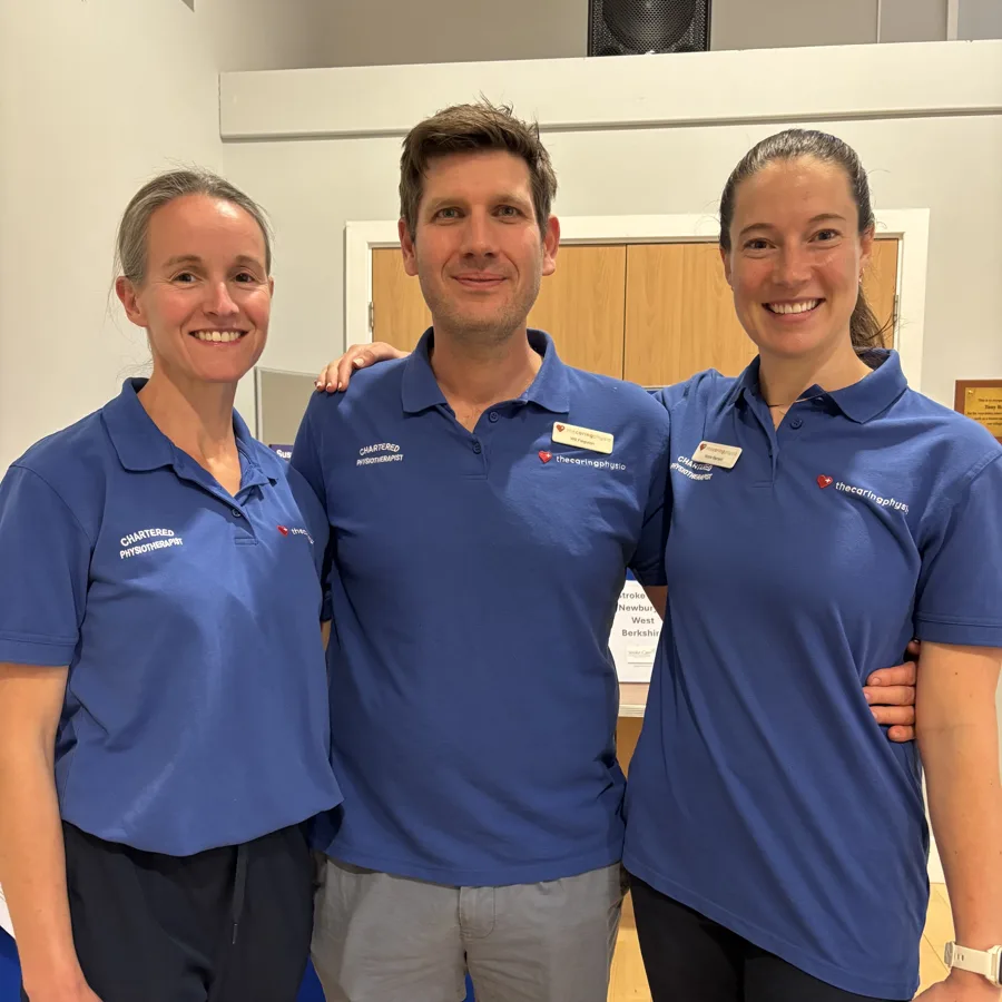 Physiotherapists Vicky H., Will Ferguson and Nicole S. in The Caring Physio uniforms at a Stroke Care for Newbury and West Berkshire event